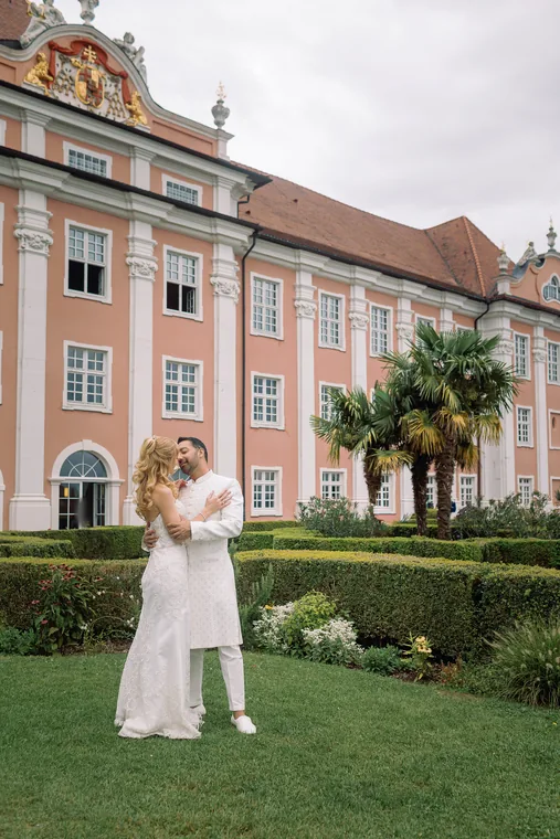 Christine and Ro on the lawn below the palace
